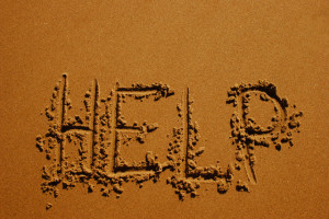 HELP Written in the Sand --- Image by © Christine Mariner/Design Pics/Corbis